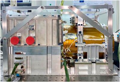 Satellite-borne atomic clock based on diffuse laser-cooled atoms